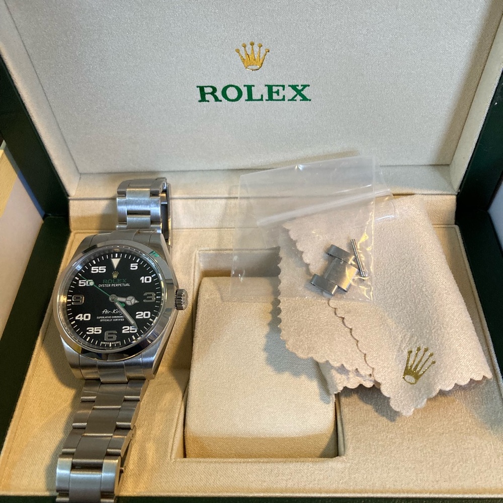 Rolex Silver and Black Dial Watch